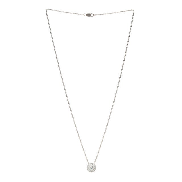 Stones: diamond round brilliant cut 1.3 - 4.2 mm .40ctw FG color/ VS1-2 clarity Chain Length: 16.5 in. Pendant Length: 3/8...