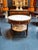 The French Louis XVI Mahogany Center Table is a luxurious and elegant piece of furniture that adds a touch of...