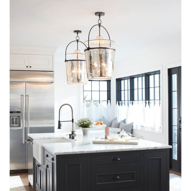 The Emerson Pendant is an updated classic look for modern traditional spaces. The antique mercury glass finish is even...