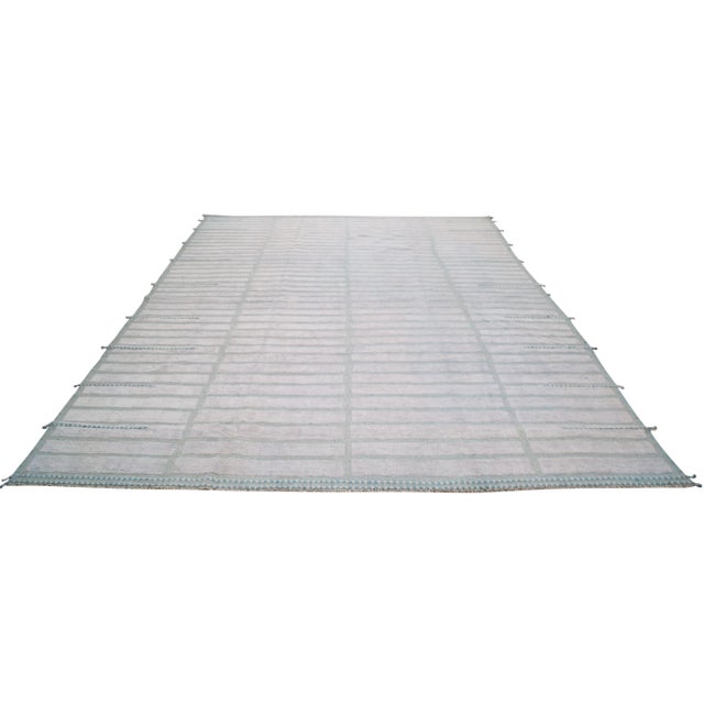 Moroccan Beni Ourain hand knotted rug with natural colors, contemporary style and soft texture.