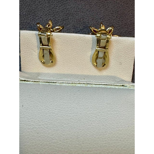 1.6Ct Natural Marquise Ruby& .80 Ct Diamond Clip on Earring 18 KYG This exquisite pair of earrings are beautifully crafted...