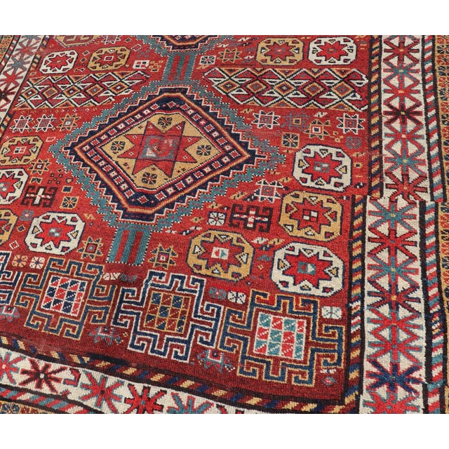 Antique Qashqai Rug With Geometric Motifs in Red, Blue, and Golden Yellow For Sale - Image 10 of 13
