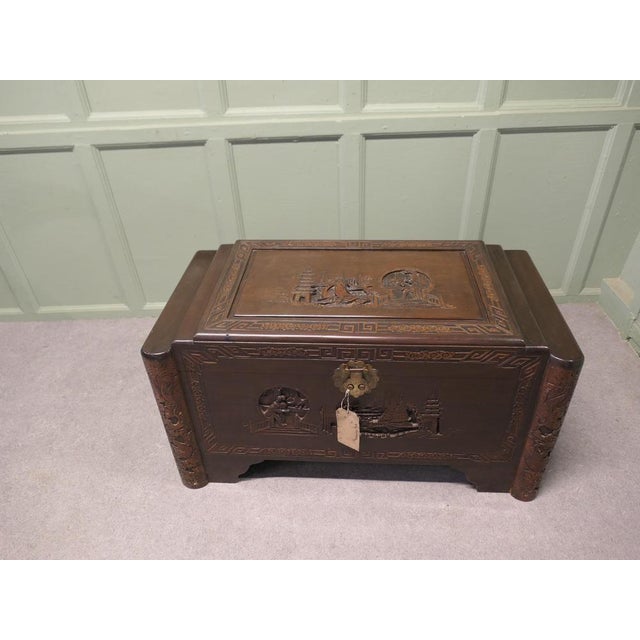 Art Deco Oriental Carved Dark Camphor Wood Chest This Beautiful Carved Chest is made from Camphor Wood, for those of you...