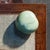 This small presentation box from the late Qing dynasty (1644-1911) is cloaked in a rare shade of celadon-teal lacquer, an...