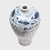 This elegant, blue-and-white vase from the early 20th century honors the long history of cultural exchange between...