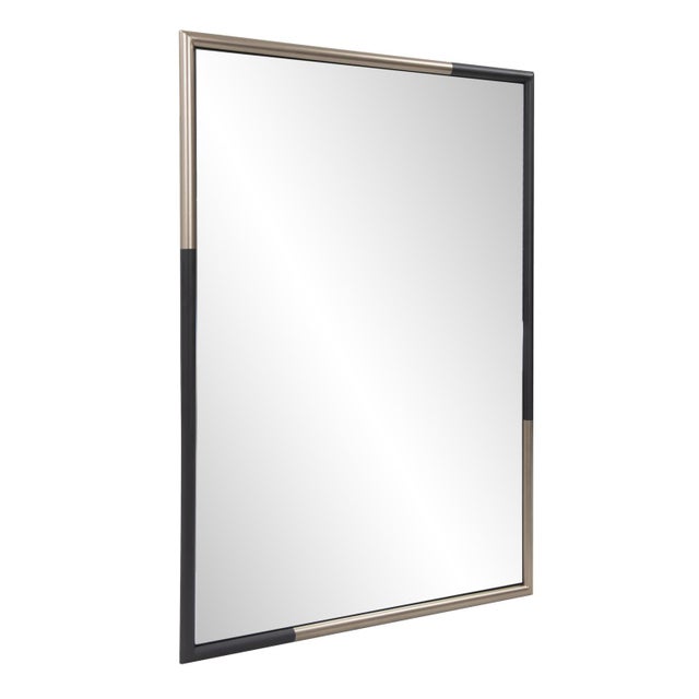 The Fitzgerald collection of mirrors all feature the stunning and rich color combination of antique brass and a matte...