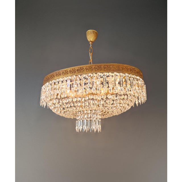 An elegant oval flush mount chandelier with balanced proportions and a refined presence. Fully restored in our Berlin...
