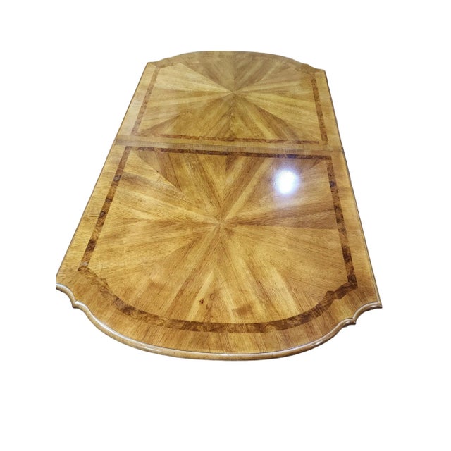 Beautiful mid century Continental style large extending dining table, starburst finish, light mahogany construction, on...