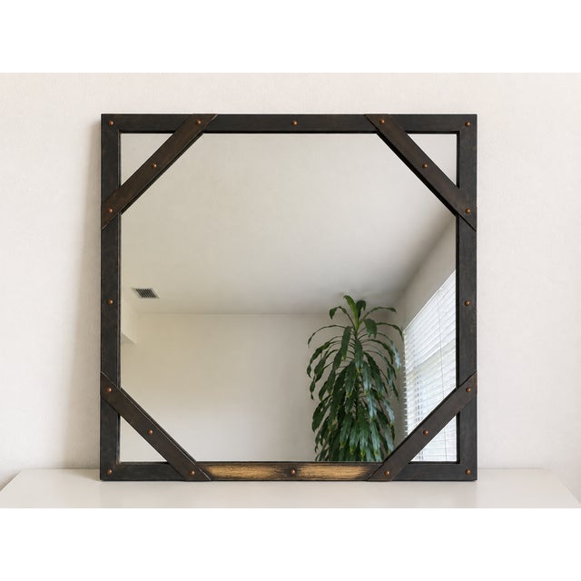 A unique find - a vintage wall mirror by Sarreid Ltd., featuring the company's iconic architectural frame clad in richly...