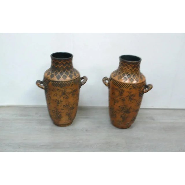 Two impressive floor vases with handles In a copper-like colored beige Aztec pattern from the Westerwald. Two really great...