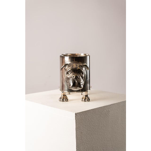 A unique bottle holder in the shape of a bulldog, made in France or Italy during the 1970s. Crafted from polished metal,...