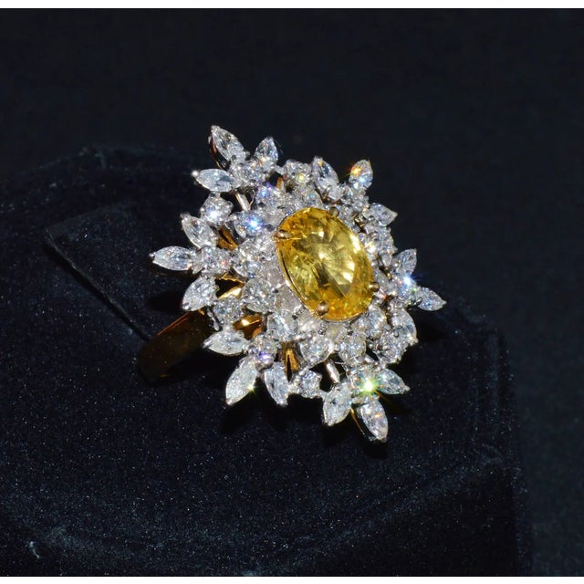 Top quality 18K solid gold 6.09CTS diamond and sapphire ring. This ring features a large oval 3.48CTS natural, no heat,...