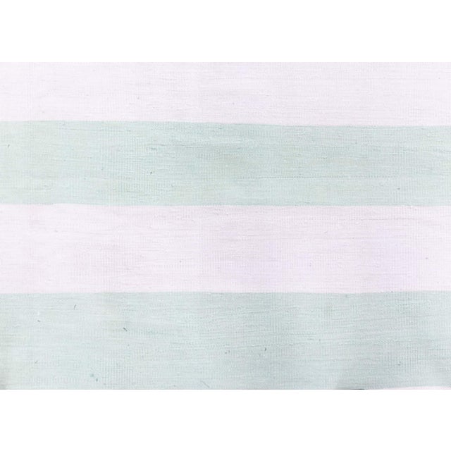 Vintage Indian Dhurrie Rug – Soft Mint Green and Beige Stripes Size: 10'8" × 14'7" (325 × 444 cm) A masterclass in...