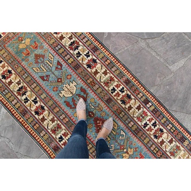 An outstanding runner with an intricate geometric motif throughout and multiple borders. This antique treasure still oozes...