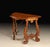 Handcrafted in Italy from select solid walnut, this console table reflects the rustic elegance and sculptural character of...