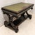 I love this 19th century English regency revival writing table with carved dolphin base and green leather top. It could...