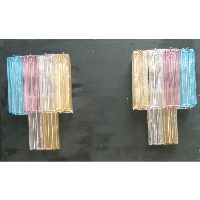 Pair of hand-blown and hand-crafted Murano glass appliques. Square shaped glass with full length grooves on each side....