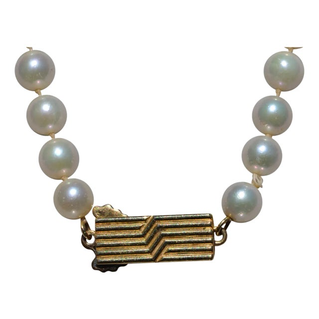 The Miki: Mikimoto Pearl Strand with Yellow Gold Mid Century Clasp For Sale