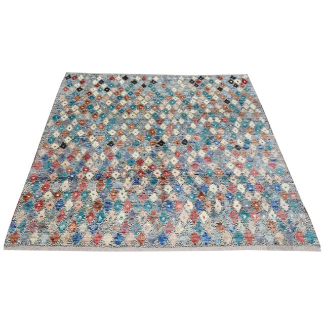 Moroccan Beni Ourain hand knotted rug with natural colors, contemporary style and soft texture.