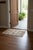 This handcrafted geometric jute doormat adds natural texture and modern character to any entryway. Expertly handwoven from...