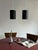 When lit, a soft warm glow spills from the open base of each shade — the quiet payoff of the Louis Poulsen cylinder...