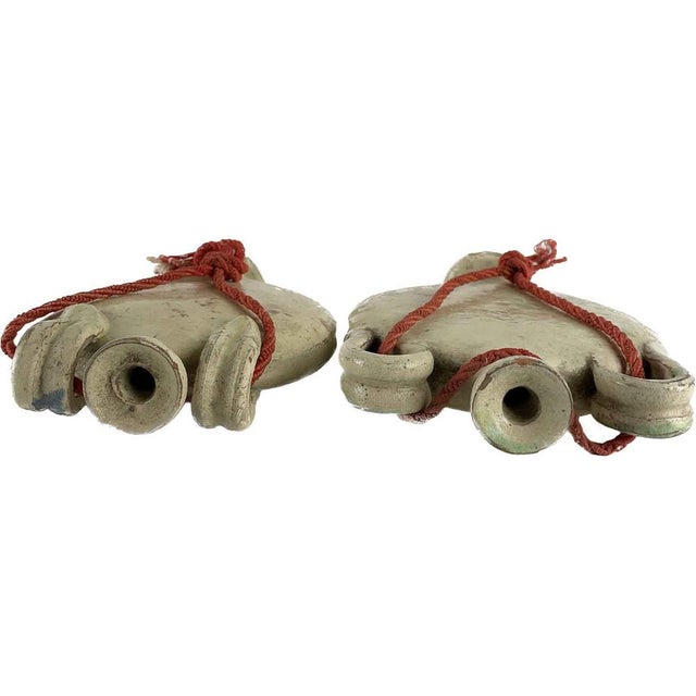 Pair of Ceramic Wayfarer's Flasks from the late 1800s, lenticular in shape with a white background and abstract...