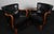 Alfred Christensen set of lounge chairs new original upholstered with black leather. Armrest and legs of stained beech....