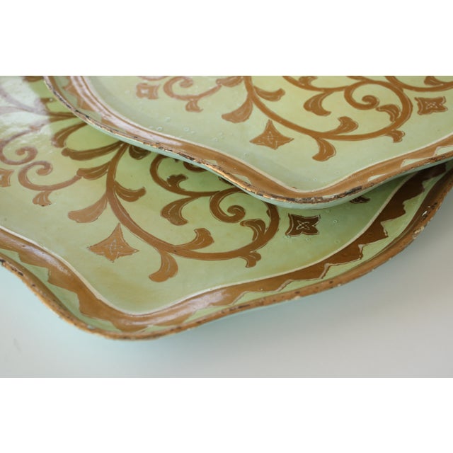 Pair of Italian gilded tray's hand painted in the Florentine tradition. Both trays are the same size. Shipping: We...