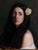 Oil on canvas portrait of a girl with a white rose in her hair. Realized by Marco Fariello in 2023. Excellent condition....