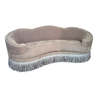 Curved Gold Sofa With Fringe and Nail Head Trim For Sale
