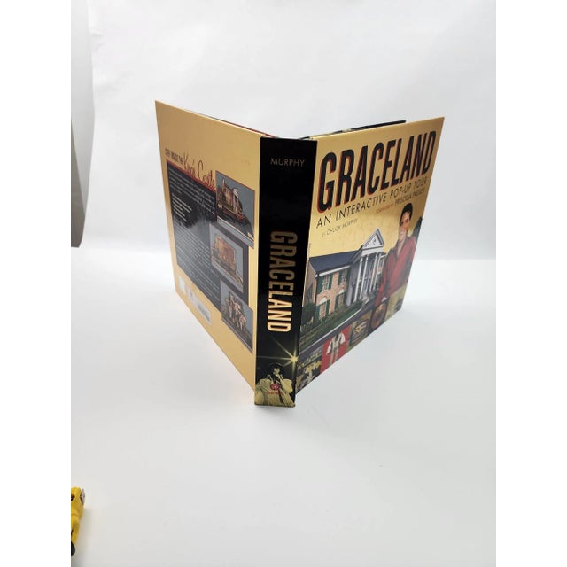 Graceland: An Interactive Pop-Up Tour by Chuck Murphy (2006-10-26) - Foreword by Priscilla Presley.Hardcover interactive...