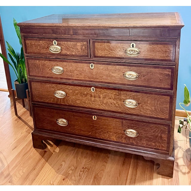 Late 18th Early 19th century solid quartered oak dresser with mahogany inlays and pine for the drawer sides and bottoms....
