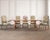 A distinguished set of ten Country French Provincial, or Louis XV-style dining chairs artisan made by Minton-Spidell, Los...