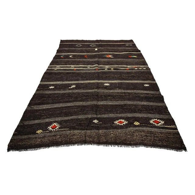 Modern vintage hand woven Kilim rug from Afyon region of Turkey. Approximately 50-60 years old. In very good condition