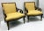 This is a pair of neo-classical style bergere chairs with faux tortoise and silver gilt frames.the upholstery is in good...
