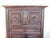 18th century French walnut paneled armoire from Normandy, carved and dated 1718 on the central panel. A well proportioned...