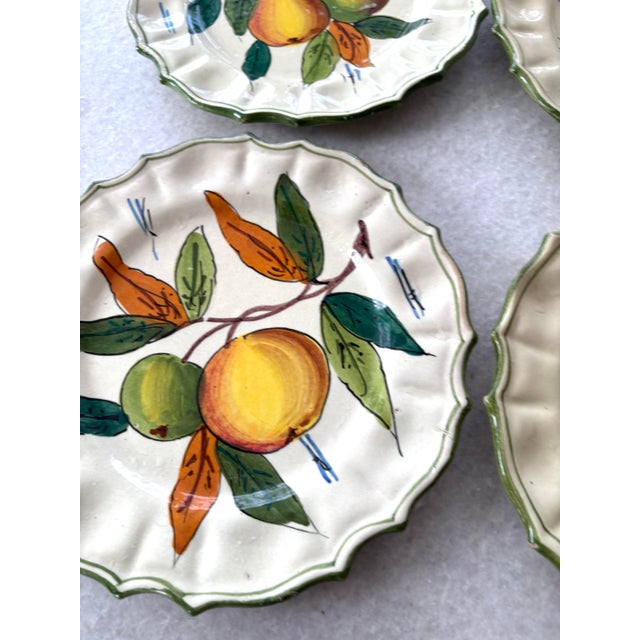Gorgeous collection of Antique fruit plates made of fine China handpainted in Italy.