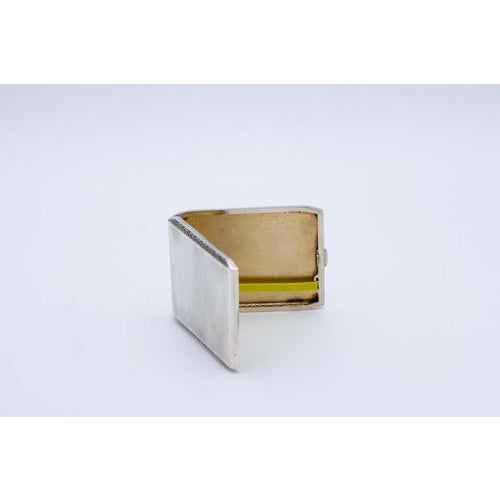 Plain Silver Cigarette Case with Beveled Corners, in Very Good conditions. Designed 1920 to 1949 This piece has an...