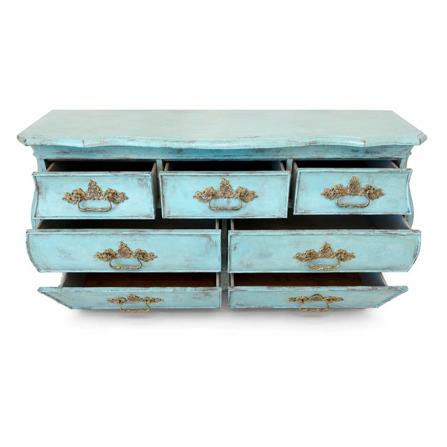 A breathtaking Hooker Furniture turquoise French Provincial bombe dresser, hand-finished in a richly layered patina that...