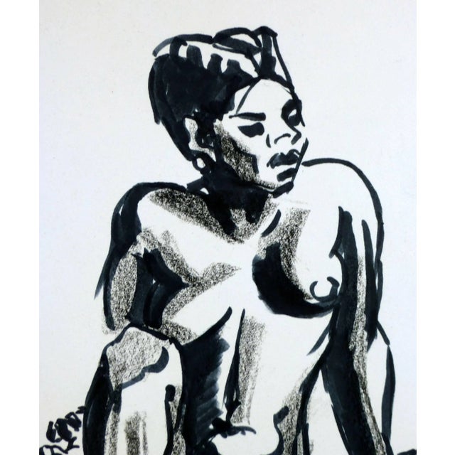 Classic ink drawing of nude female reclining, circa 1990. Original artwork on paper displayed on a white mat with a gold...