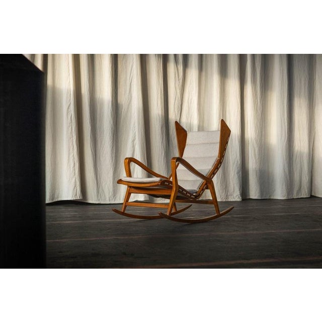The Model 572 rocking chair stands as a rare and refined example of Italian furniture design from the mid-1950s, embodying...