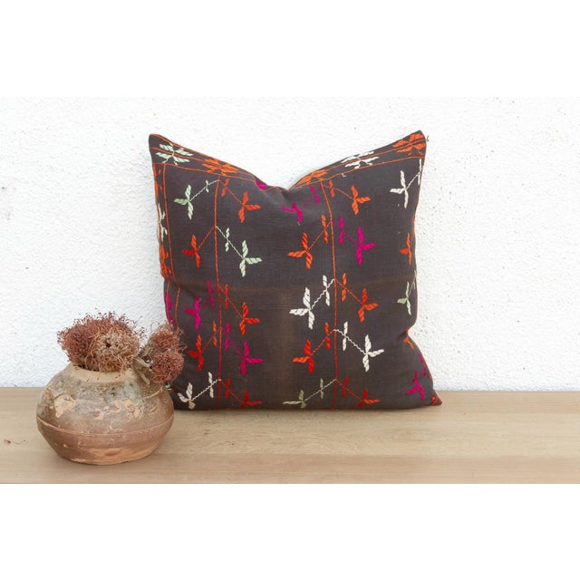 This 18-inch square pillow is a luminous masterpiece of Antique Phulkari craftsmanship, repurposed from a rare 19th-...