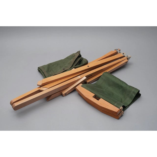 1960s. The transport bag also serves as the backrest. There are currently two folding chairs. One of the two fabric...