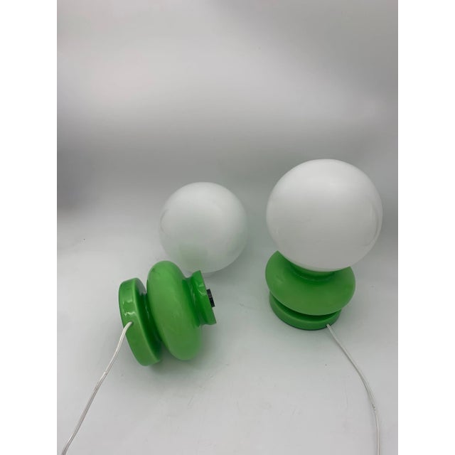 Fantastic and rare pair of table lamps in good condition made in Italy in good condition. They have few sign of the time...