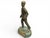 A substantial mid-century bronze sculpture depicting an industrial worker or foreman in purposeful stride, raised on an...