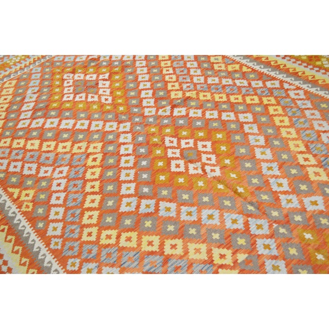 Vintage Afghan Maimana hand woven kilim with natural colors and geometric pattern.