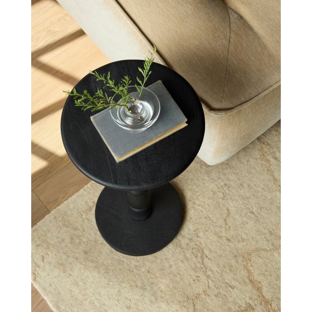 Introducing the Harare End Table, a beautiful addition to any space that seamlessly combines elegance and functionality....