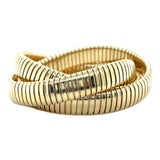 Late 20th Century Sidney Garber, 18k Yellow Gold Rolling Bangle Bracelet For Sale