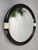 1970s mirror with smoked acrylic glass frame. Corner is slightly tiltable via beige hinges. Easy to hang. In excellent...