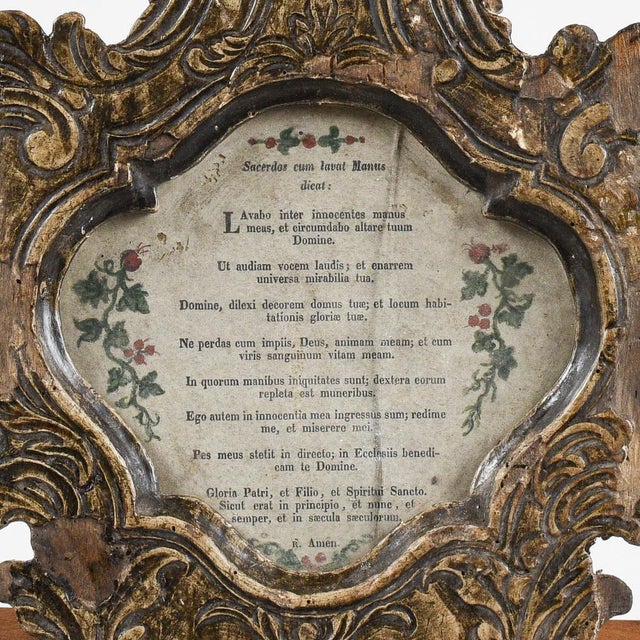 Cartagloria, a small decorative lectern traditionally placed on the altar in catholic churches to contain the sacred texts...